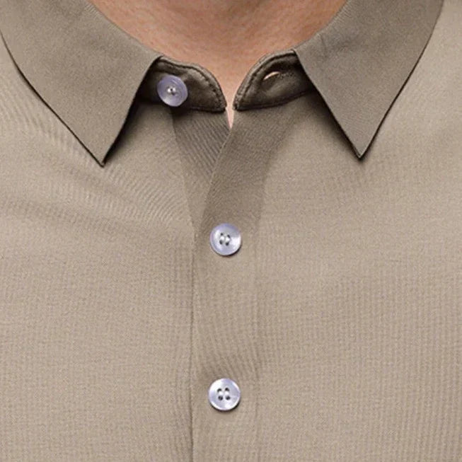 Camisa Polo Raffenzi RZ145, design contemporâneo, perfeita para ocasiões casuais ou formais com elegância e resistência duradoura.