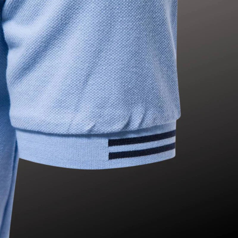 Camisa Polo Masculina Raffenzi RZ150 em algodão, design sofisticado e detalhes bordados que valorizam o visual masculino com elegância e conforto.