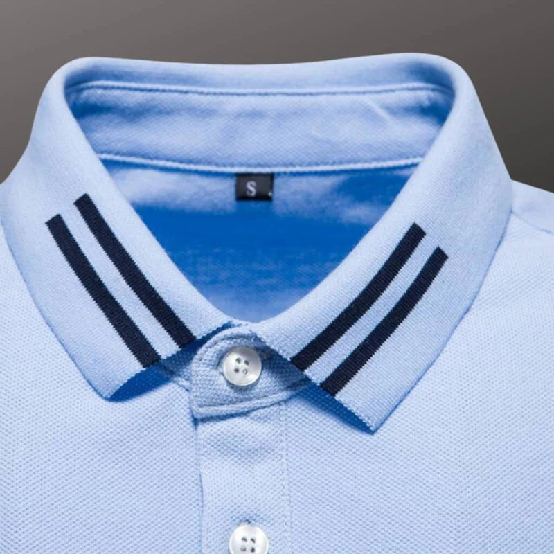 Camisa Polo Masculina Raffenzi RZ150 em algodão, design sofisticado e detalhes bordados que valorizam o visual masculino com elegância e conforto.