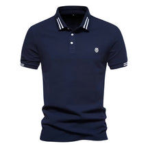 Camisa Polo Masculina Raffenzi RZ150 em algodão, design sofisticado e detalhes bordados que valorizam o visual masculino com elegância e conforto.