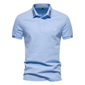 Camisa Polo Masculina Raffenzi RZ150 em algodão, design sofisticado e detalhes bordados que valorizam o visual masculino com elegância e conforto.