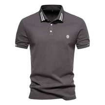 Camisa Polo Masculina Raffenzi RZ150 em algodão, design sofisticado e detalhes bordados que valorizam o visual masculino com elegância e conforto.