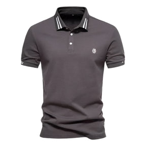 Camisa Polo Masculina Raffenzi RZ150 em algodão, design sofisticado e detalhes bordados que valorizam o visual masculino com elegância e conforto.