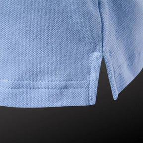 Camisa Polo Masculina Raffenzi RZ150 em algodão, design sofisticado e detalhes bordados que valorizam o visual masculino com elegância e conforto.